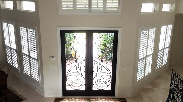 St. George foyer with glass doors and indoor shutters